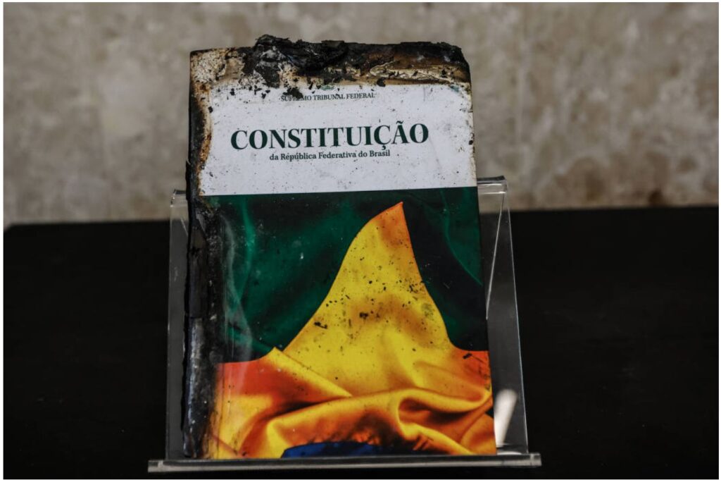 Images of a scorched edition of the Brazilian Constitution