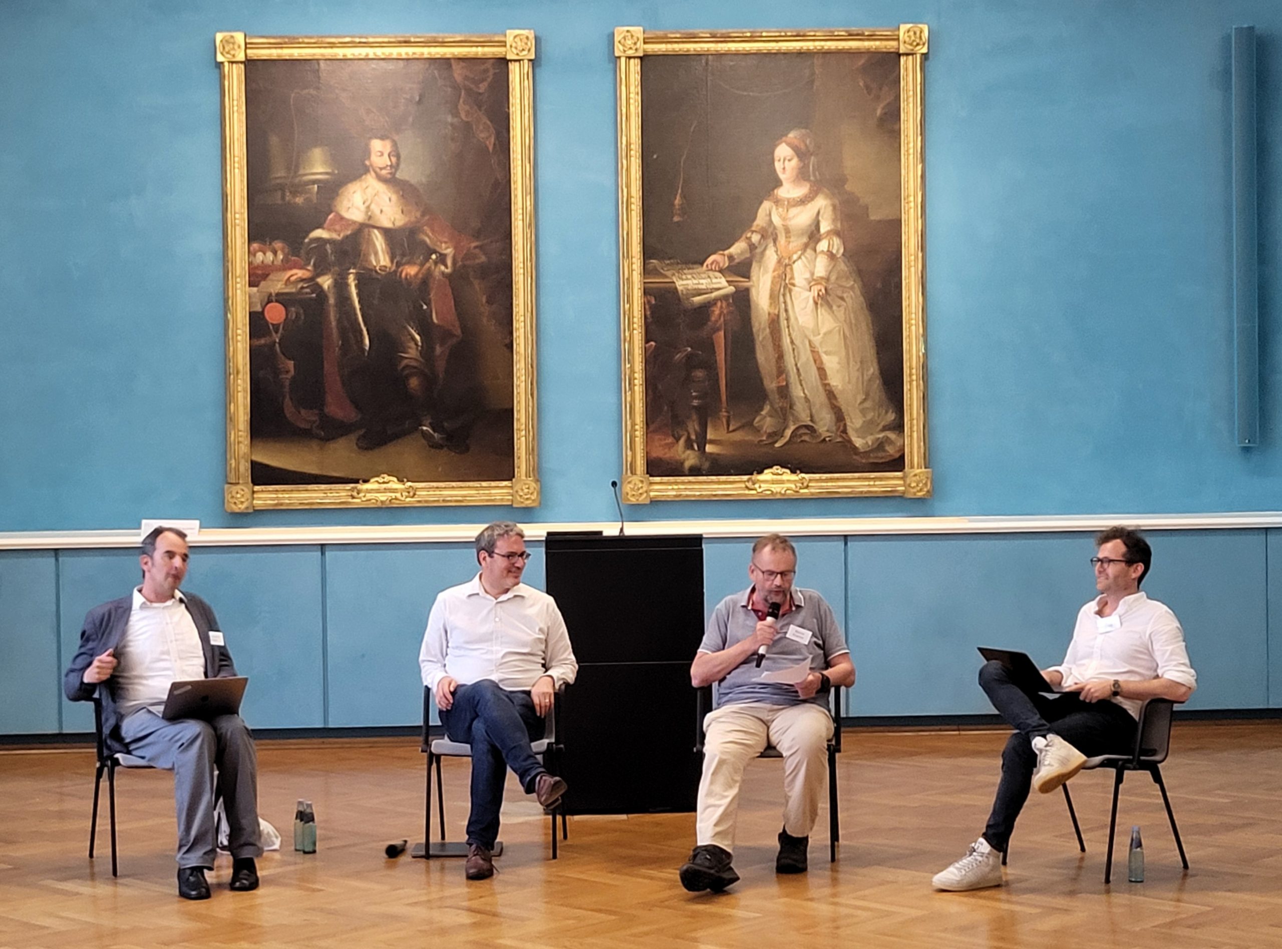 A photo of three participants of the conference