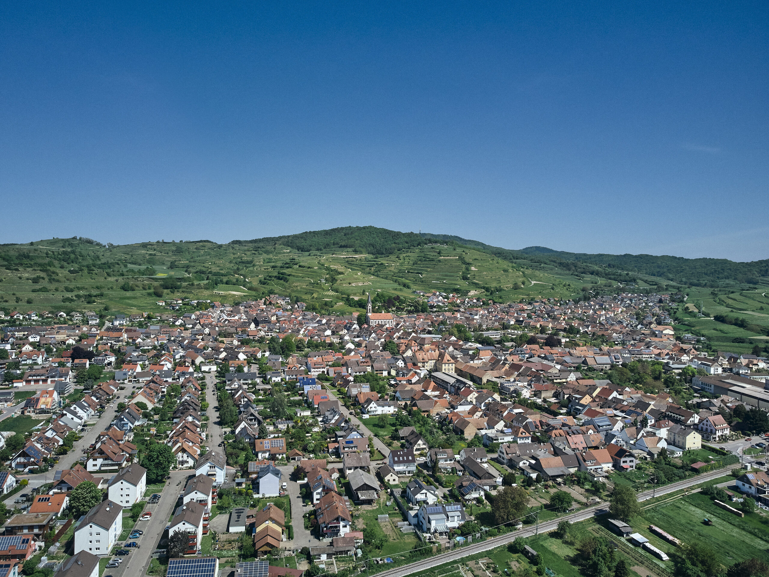 A small city in a hilly and rural landscape