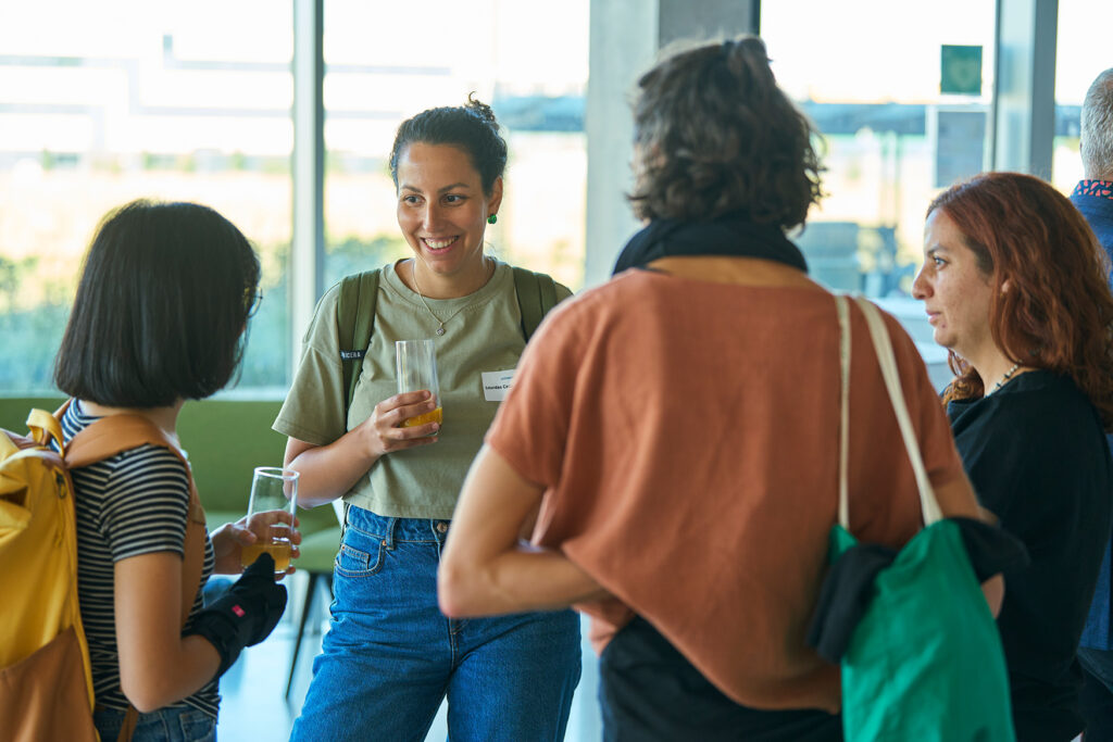 A group of students talking to each other.