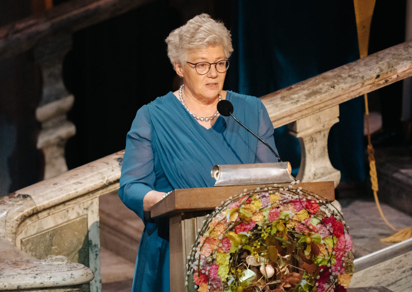 Anne L'Hullier holding a lecture