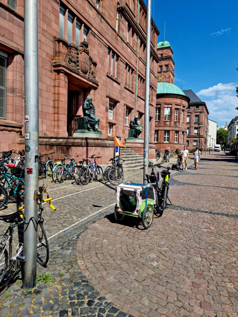 University of Freiburg (Albert Ludwig University of Freiburg). The image shows a main entrans to the historic building. The university was founded in 1457 by the Habsburg dynasty as the second university in Austrian-Habsburg territory after the University of Vienna. Captured during summer season.