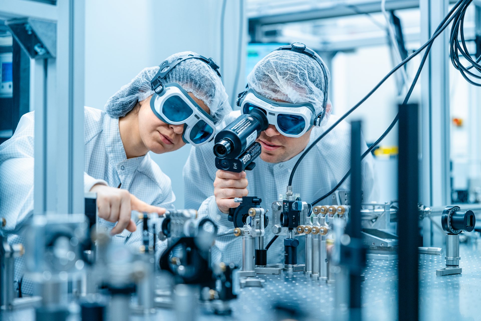 Two Researchers with microscope