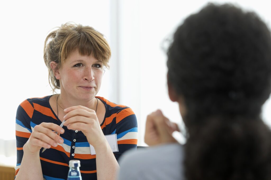 CORA Training: Two female scientists in discussion