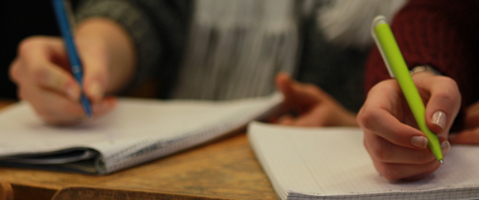 Students writing.