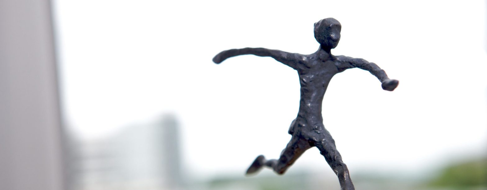 Kleine Skulptur, laufender Mensch