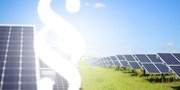 Solar panels in a green field